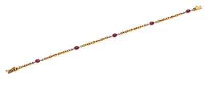 Flexible bracelet
in 18K yellow and white...