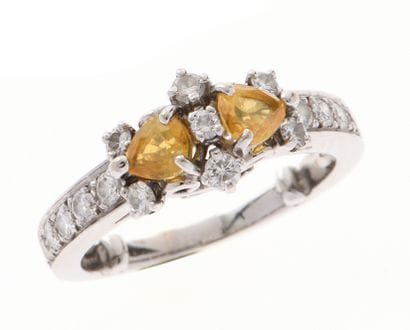 Ring
in 18k white gold 750°/°° set with two...
