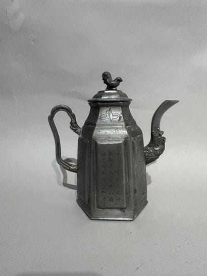 CHINA
Pewter teapot with a Fo dog design...