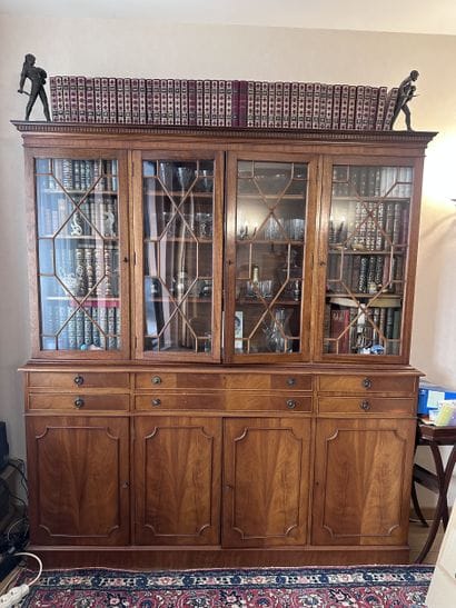 Light mahogany bookcase; the upper section...