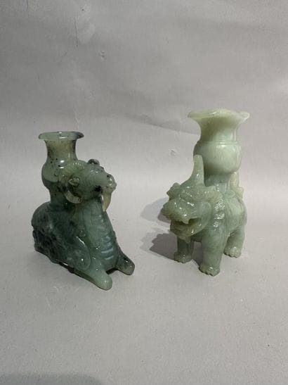 CHINA
Two jade CANDLESTICKS decorated with...