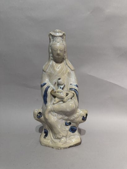 CHINA
GUANYIN with a child, made of beige...
