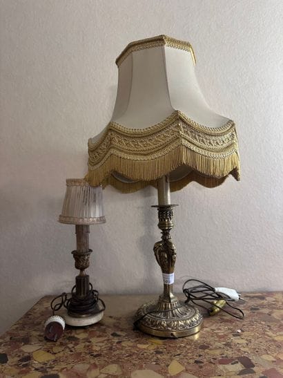 Gilded bronze lamp base decorated with mascarons...