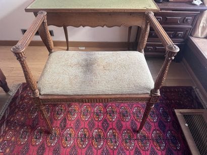 Small walnut piano bench with baluster-style...