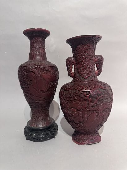 CHINA
Two baluster vases in red Beijing lacquer,...
