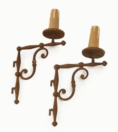 Work, 1940
Pair of wrought-iron wall sconces...