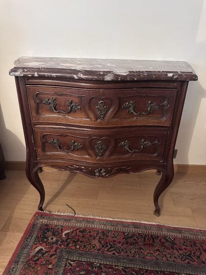 Curved chest of drawers with molded fruitwood...