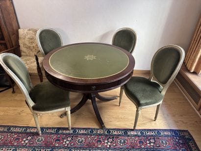 A set of six chairs with medallion-shaped...