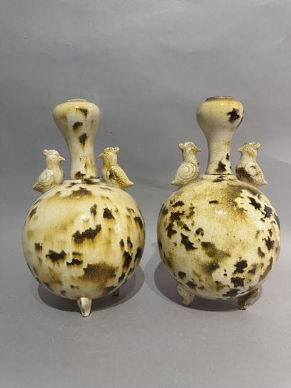 CHINA
Pair of tripod baluster vases made...