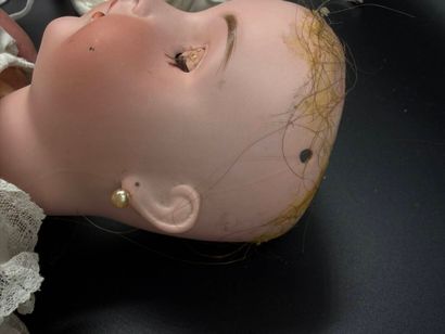 BSW GERMANY.
Porcelain head doll, fixed eyes,...