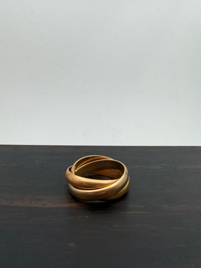 CARTIER
Three-colored 18K (750) gold ring,...