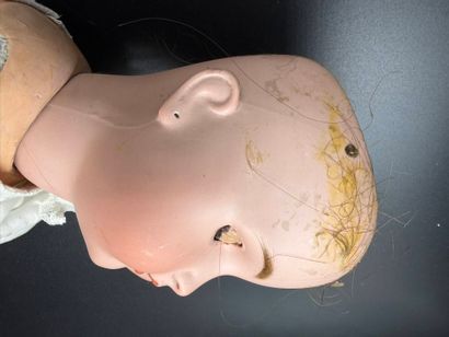 BSW GERMANY.
Porcelain head doll, fixed eyes,...