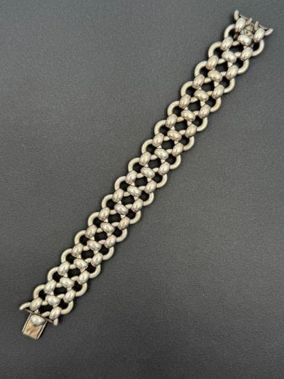 HERMÈS
Ribbon bracelet in silver articulated...