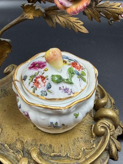 In the Meissen style
An ormolu inkwell of...