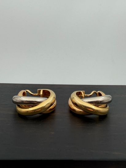 CARTIER
Pair of ear clips in three colored...