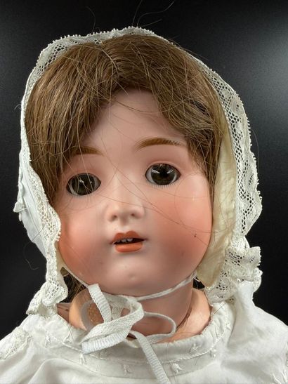 BSW GERMANY.
Porcelain head doll, fixed eyes,...