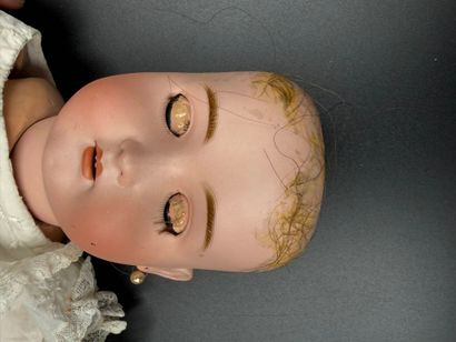 BSW GERMANY.
Porcelain head doll, fixed eyes,...