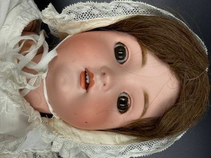 BSW GERMANY.
Porcelain head doll, fixed eyes,...