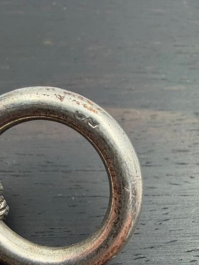 Silver bracelet,
articulated with rings joined...