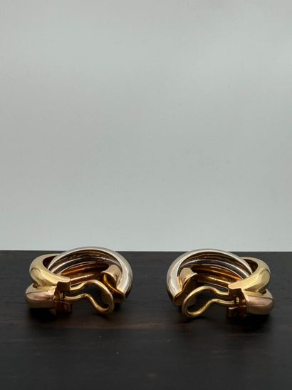 CARTIER
Pair of ear clips in three colored...