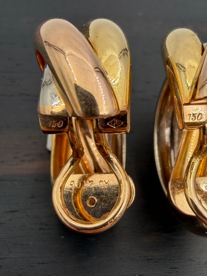 CARTIER
Pair of ear clips in three colored...