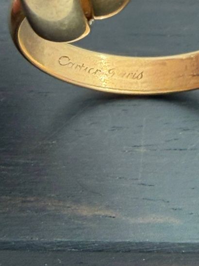 CARTIER
Three-colored 18K (750) gold ring,...