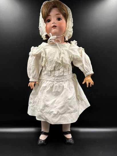 BSW GERMANY.
Porcelain head doll, fixed eyes,...