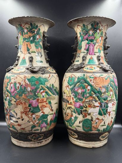 Pair of vases
in Nanking stoneware with horsemen....