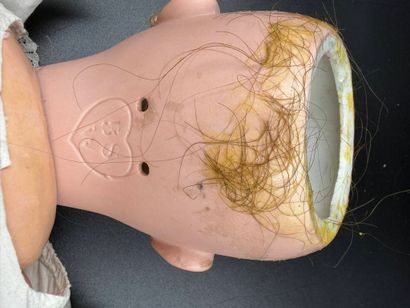 BSW GERMANY.
Porcelain head doll, fixed eyes,...