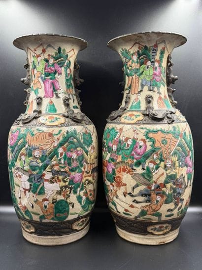 Pair of vases
in Nanking stoneware with horsemen....