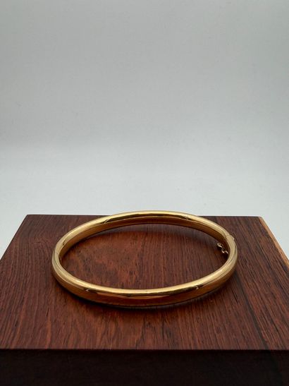 Rigid bracelet in 18K (750) yellow gold
(eagle...