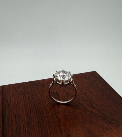 Platinum ring,
set with a round old-cut diamond...