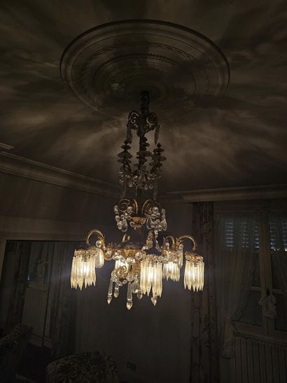 Gilded bronze chandelier with crystal pendants...