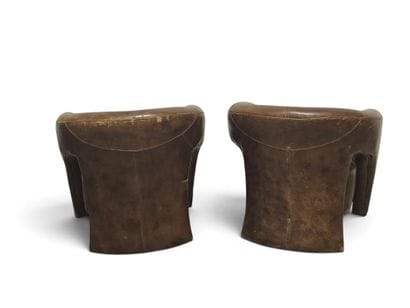 Pair of club or pilot armchairs in tan leather....