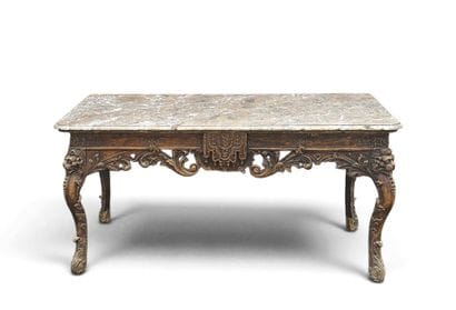 CONSOLE en bois sculpté à décor de protomés...