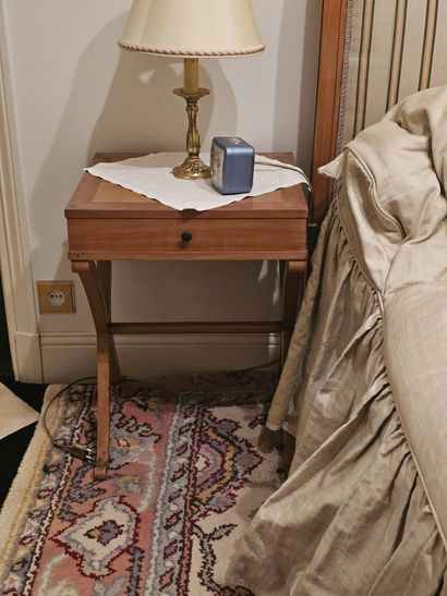 Pair of cherry wood nightstands with curule...