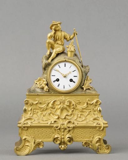 PENDULE au jeune jardinier en bronze doré...