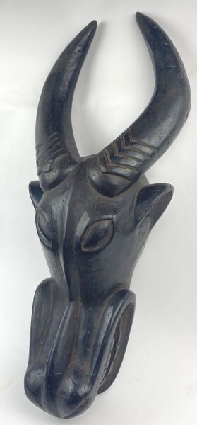 CAMEROON - BAMILEKE People

Helmet mask representing...