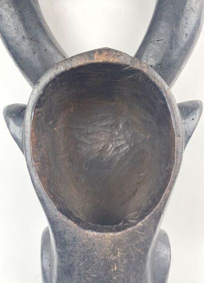 CAMEROON - BAMILEKE People

Helmet mask representing...