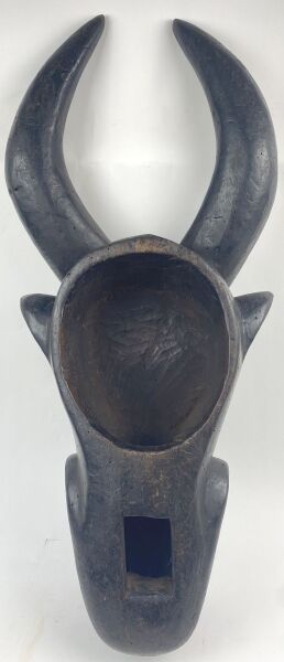 CAMEROON - BAMILEKE People

Helmet mask representing...
