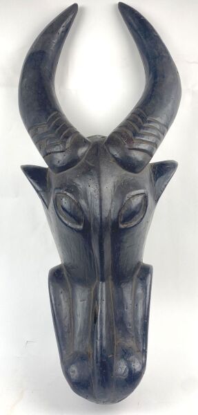 CAMEROON - BAMILEKE People

Helmet mask representing...
