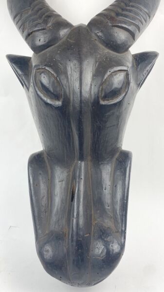 CAMEROON - BAMILEKE People

Helmet mask representing...