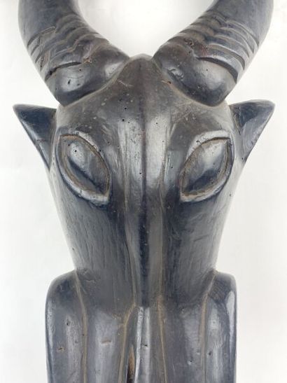 CAMEROON - BAMILEKE People

Helmet mask representing...