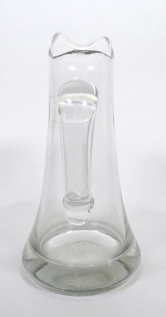 Ensemble en verre comprenant :
- Une bouteille...