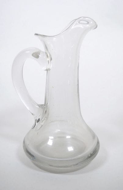 Ensemble en verre comprenant :
- Une bouteille...