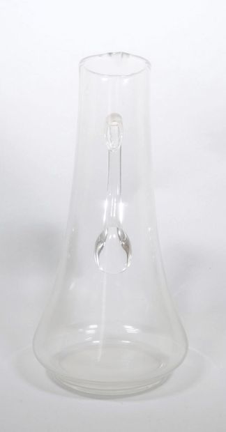 Ensemble en verre comprenant :
- Une bouteille...