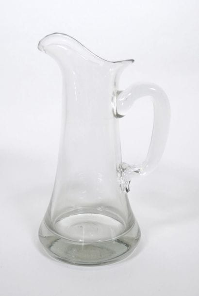 Ensemble en verre comprenant :
- Une bouteille...