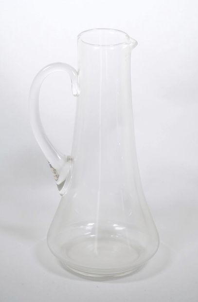 Ensemble en verre comprenant :
- Une bouteille...