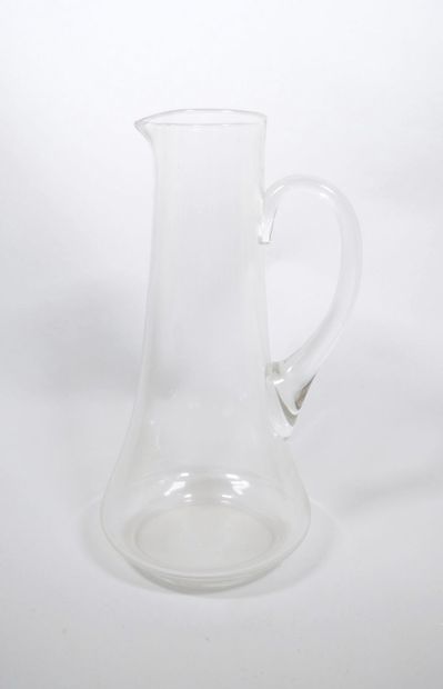 Ensemble en verre comprenant :
- Une bouteille...