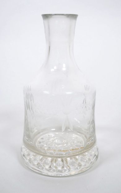 Ensemble en verre comprenant :
- Une bouteille...